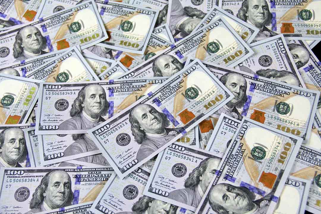 a pile of U.S. 100-dollar bills
